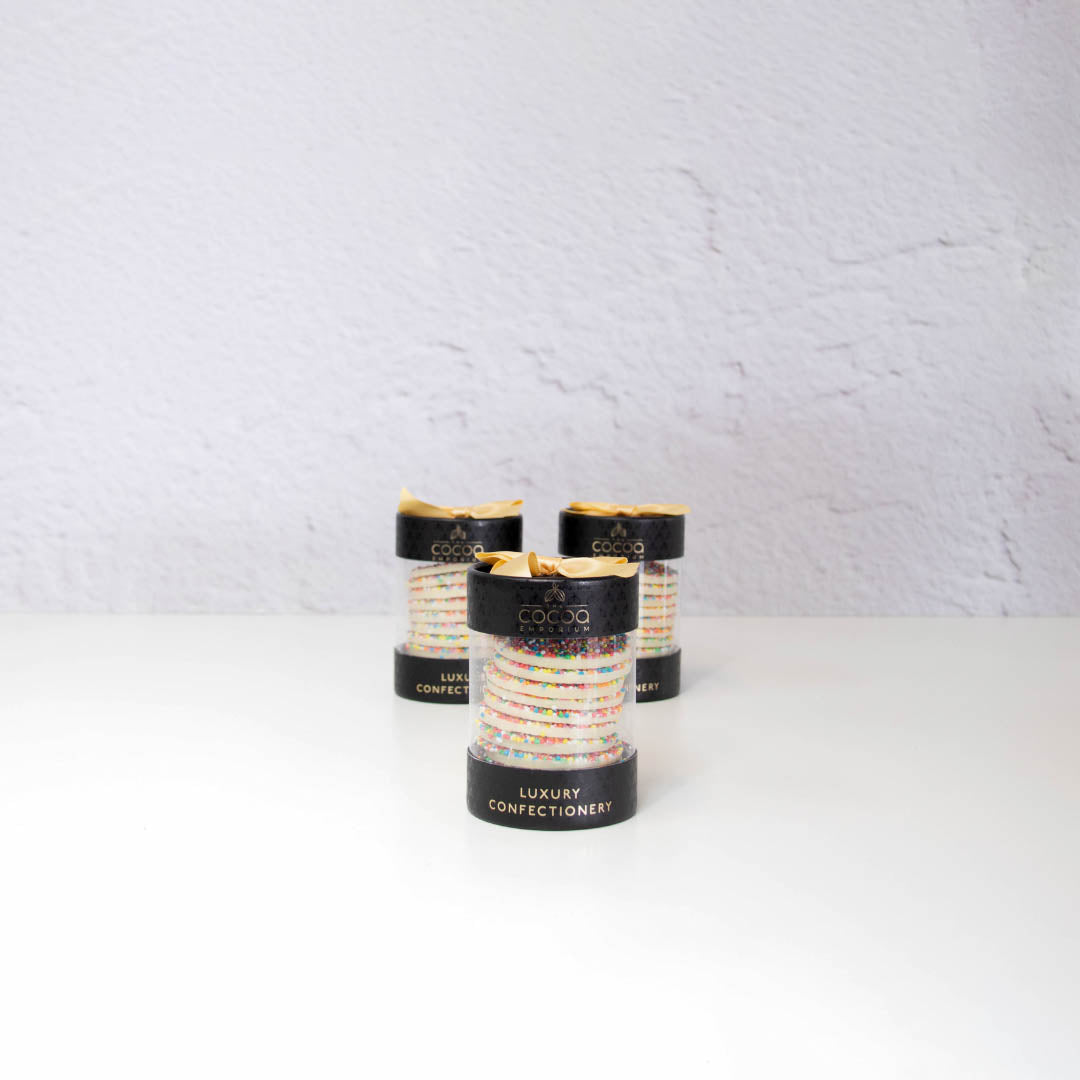 White Chocolate Sprinkle Discs Coco Emporium - Olive and Fig Hampers and Flowers